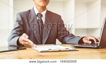 Looking for direction and inspiration, Business working at an office, Office desk table with computer, supplies, flower. Top view. Copy space for text