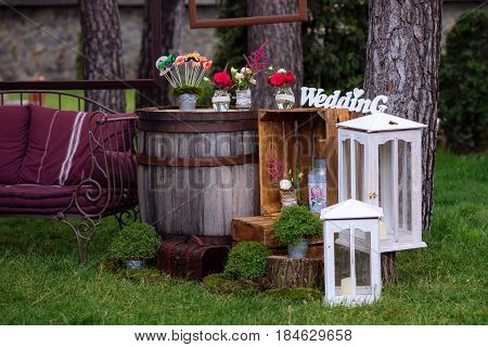 Beautiful Wedding Ceremony Outdoors. Decorated Chairs Stand On The Grass. Wedding Arch Made  Flowers