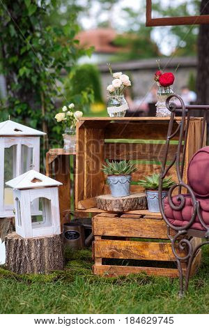 Beautiful Wedding Ceremony Outdoors. Decorated Chairs Stand On The Grass. Wedding Arch Made  Flowers