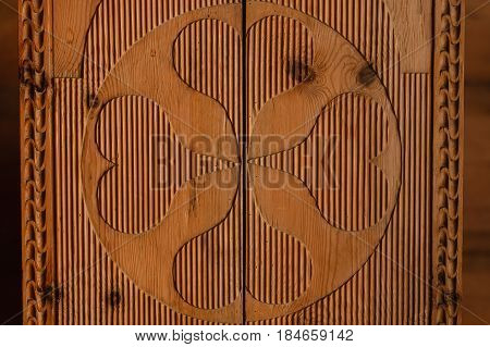 Textures patterns and backgrounds concept. Light old wooden wall detail board with decoration closeup