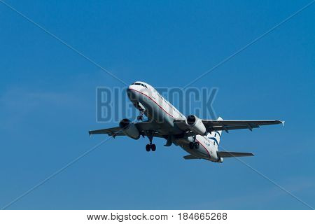 CORFU, GREECE - April 25: An Aegean Airbus charter taking off  in Corfu,Aegean is an airline from Greece with its headquarters in Athens
