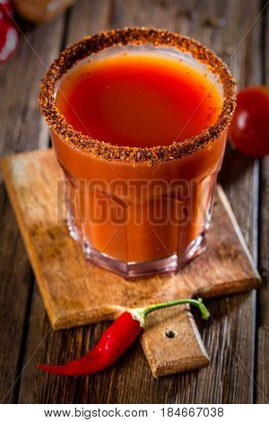 Spicy bloody Mary cocktail with smoked ground chili - merquen
