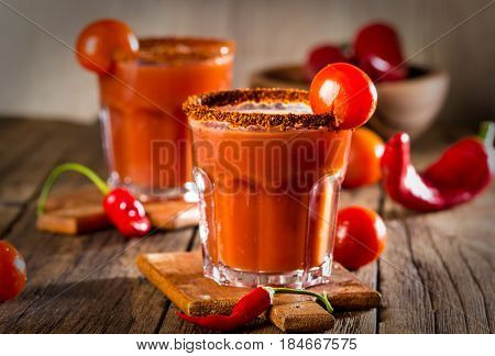 Spicy bloody Mary cocktail with smoked ground chili - merquen