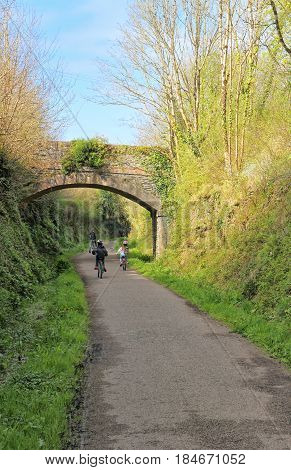 Wadebridge, Cornwall, Uk - April 6 2017: Cyclists Riding Along The Camel Trail From Wadebridge To Pa