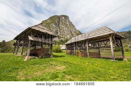 Traditional wooden double hayrack in small village of Studor near Bohinj in Slovenia during spring time