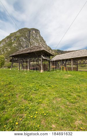 Traditional wooden double hayrack in small village of Studor near Bohinj in Slovenia during spring time