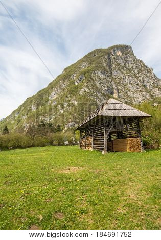 Traditional wooden double hayrack in small village of Studor near Bohinj in Slovenia during spring time