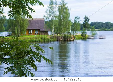 View background landscape house cottage private hotel for rest on the island on the Daugava river in Latvia