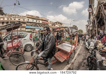 Delhi, India - January 27, 2017: Ordinary Crowdy City Life At Chandni Chowk, Old Delhi, Famous Trave