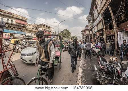 Delhi, India - January 27, 2017: Ordinary Crowdy City Life At Chandni Chowk, Old Delhi, Famous Trave