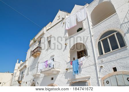 Characteristic alleyway of Locorotondo. Puglia. Southern Italy.
