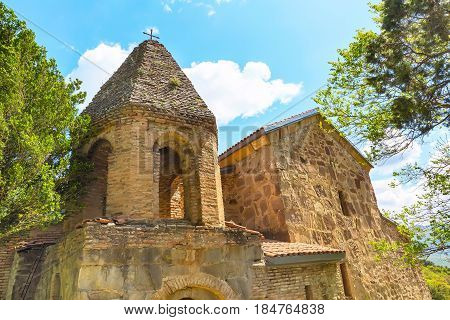 Bell tower closeup view of ancient Shio-Mgvime monastery in Georgia