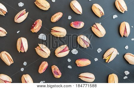 Set Of Single Inshell Pistachios And Peeled Pistachios With Large Salt Crystals