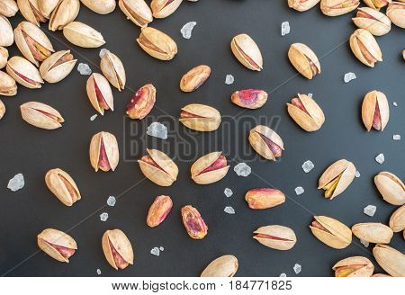 Set Of Single Inshell Pistachios And Peeled Pistachios With Large Salt Crystals