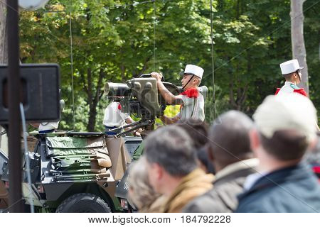 Paris France - July 14 2012. Procession of military equipment during the military parade on the Champs Elysees in Paris.