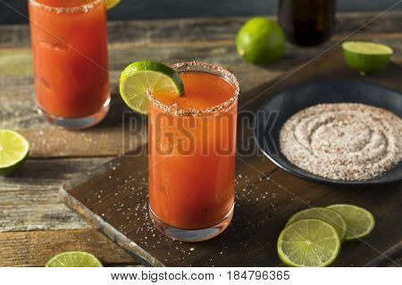 Homemade Michelada With Beer And Tomato Juice