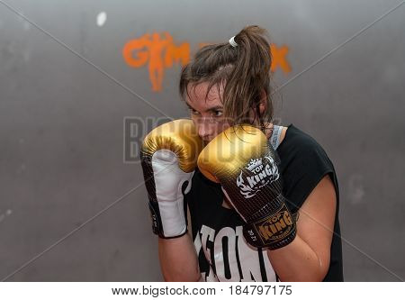 CRACOW POLAND - FEBRUARY 12 2016: Agnieszka Niestoj - talented Polish boxer durning boxing training with coach in the gym. Cracow Poland