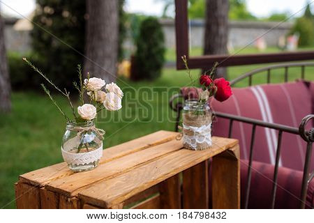 Beautiful Wedding Ceremony Outdoors. Decorated Chairs Stand On The Grass. Wedding Arch Made  Flowers