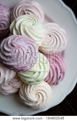 Close up of Homemade sweet zephyr. Sweet marshmallow or zephyr