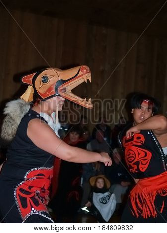 Metlakatla, Alaska - July 26, 2008;  Indigenous locals performing indoors for group of tourists at small village on Inside Passage Metlakatla Alaska.