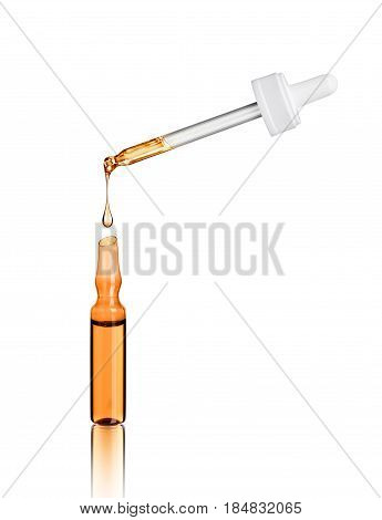 Medical ampoule with cosmetic pipette on white background