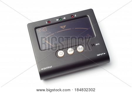 Guitar tuner isolated on white background close-up