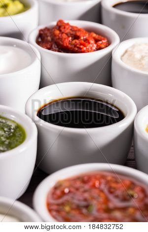 Pomegranate sauce with ketchup and ajika, a tomato, garlic, paprika and spices