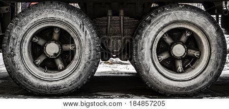 Wheels of a large truck, side view, big truck, truck suspension