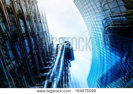 City of London multiple  exposure image includes skyscrapers of business district at sunset. UK