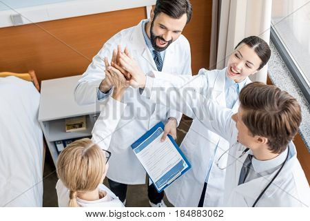 Doctors Team Giving Highfive