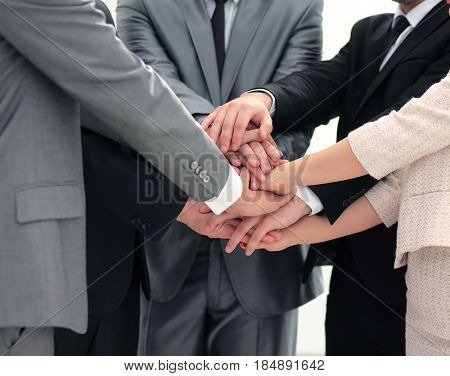 success concept collaboration: a friendly business team put thei