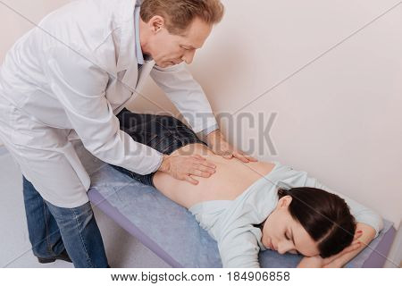 No problems allowed. Successful qualified prominent rheumatologist using his experience for curing the pain his patient experiencing in her spine