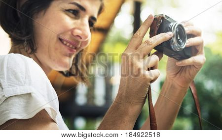 Woman traveler photographer holiday lifestyle trip