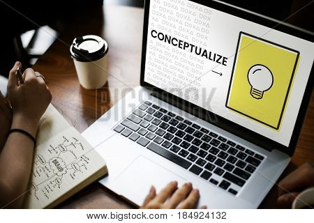 Hands working on laptop network graphic overlay
