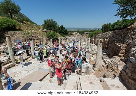 EPHESUS, TURKEY - MAY 24, 2015: Curetes Street is one of the three main streets of Ephesus between The Hercules Gate till to the Celsus Library.