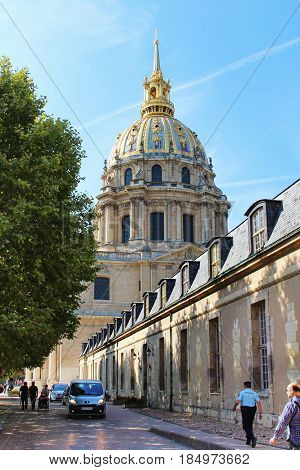 PARIS, FRANCE - SEPTEMBER 11, 2015: Tombeau Napoleon building, street and blue sky