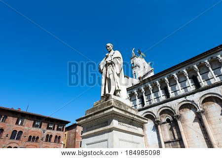 Detail of the church of San Michele in Foro and the statue of Francesco Burlamacchi in the ancient town of Lucca Toscana (Tuscany) Italy Europe