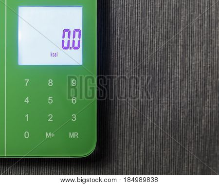 Zero kcal on the digital screen of kitchen scales