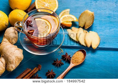 Cup Of Ginger Tea With Lemon And Honey On Dark Blue Background,