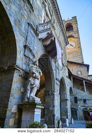 Bergamo, Italy - January 3, 2019. Statue Of Torquato Tasso In Front Of The Portico Of The Palazzo De