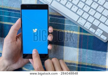 Chiang Mai, Thailand - Mar 28,2018: : Man Holding Huawei With Twitter App On The Screen.twitter Is A