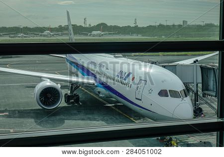 Passenger Airplane At Manila Airport, Philippines