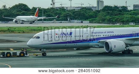 Passenger Airplane At Manila Airport, Philippines
