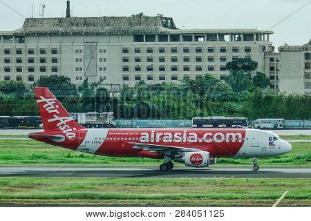 Passenger Airplane At Manila Airport, Philippines