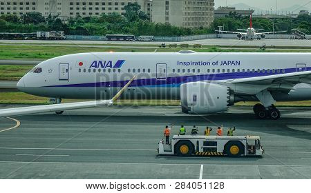 Passenger Airplane At Manila Airport, Philippines