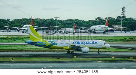 Passenger Airplane At Manila Airport, Philippines