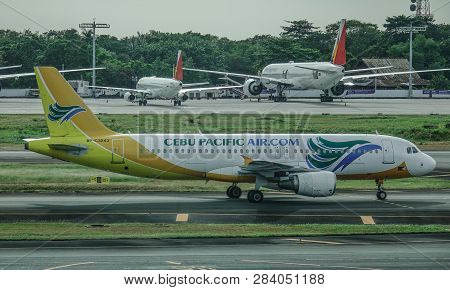 Passenger Airplane At Manila Airport, Philippines