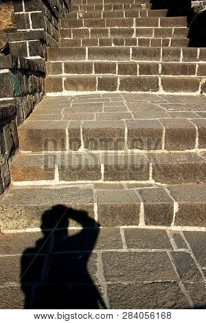 Photographer Includes His Shadow In The Frame While Shooting Stone Staircase