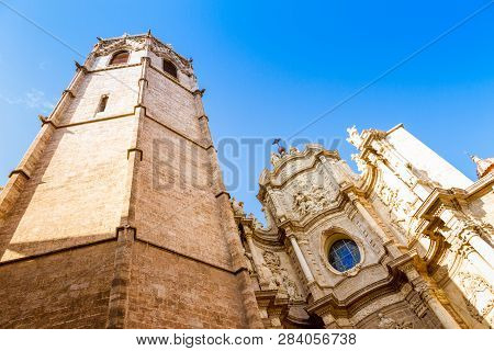 The Belfry, Known As Micalet, And The Iron Doors Of The Saint Mary's Cathedral In Valencia, Spain.