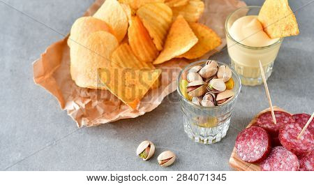 Aperitif Snacks At The Bar.relax In The Bar With Friends, Beer Party.  Selective Focus And Copy Spac